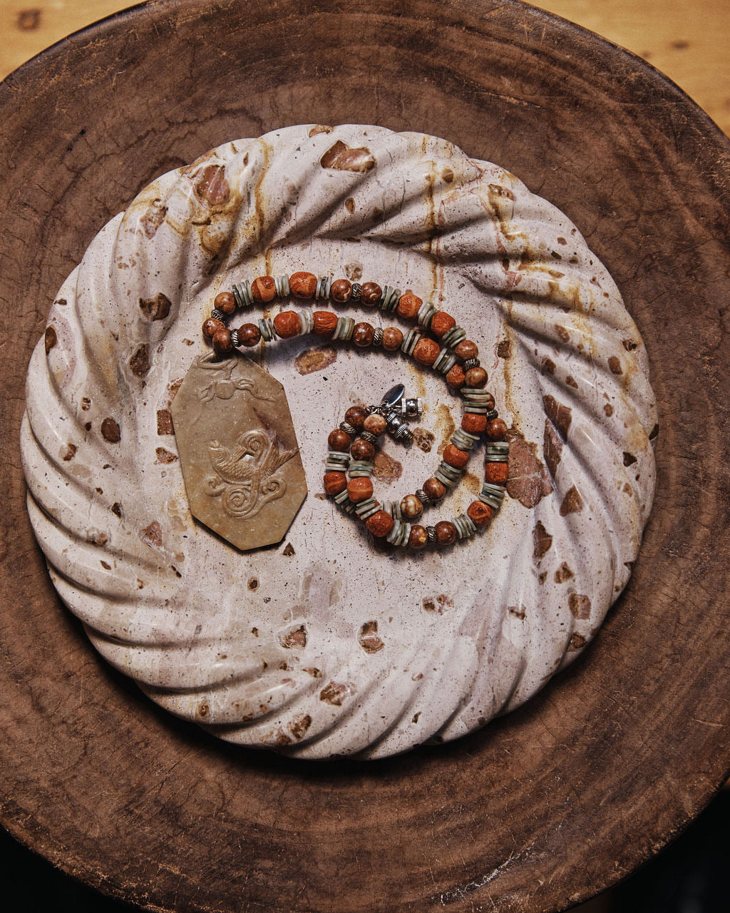 Carved stone bowl by Anastasio Home