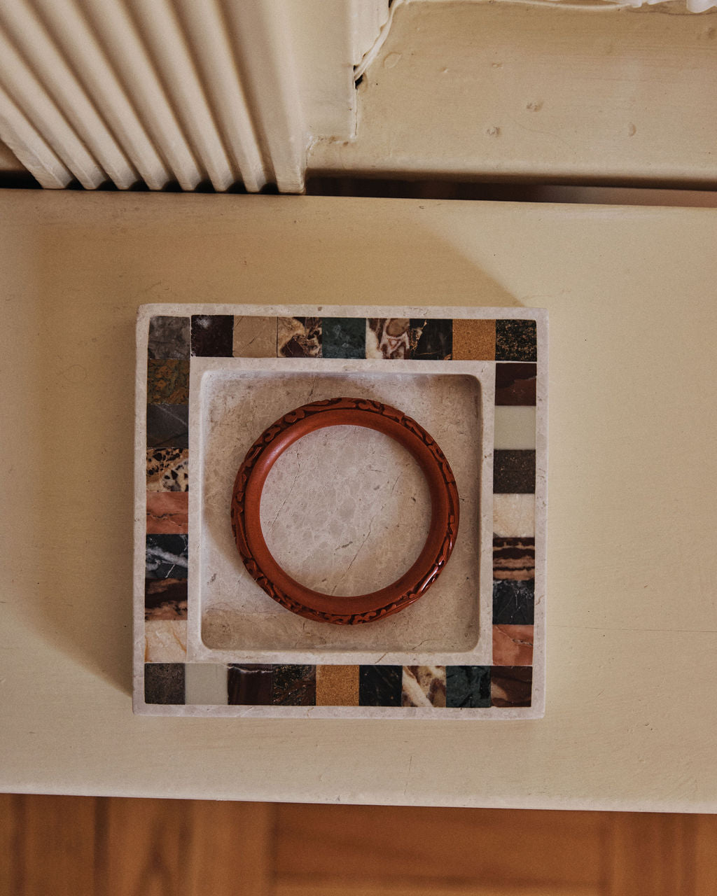 Checkerboard inlay stone tray by Anastasio Home
