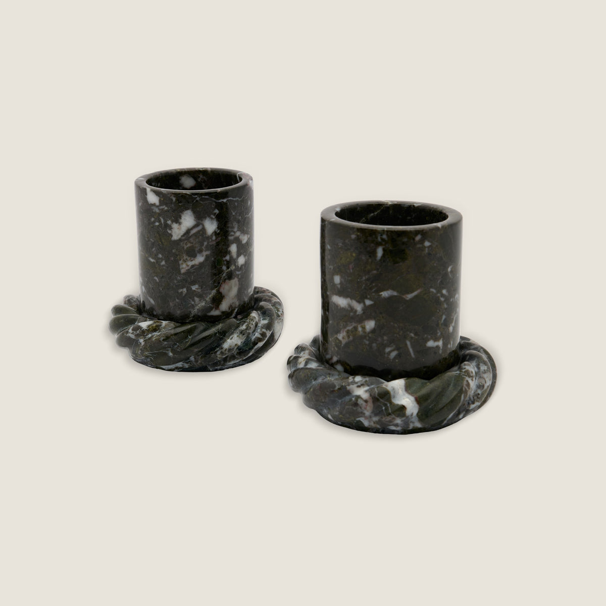 Two La Corda Piattina saucers in Kelp under La Tazzina cups in Kelp