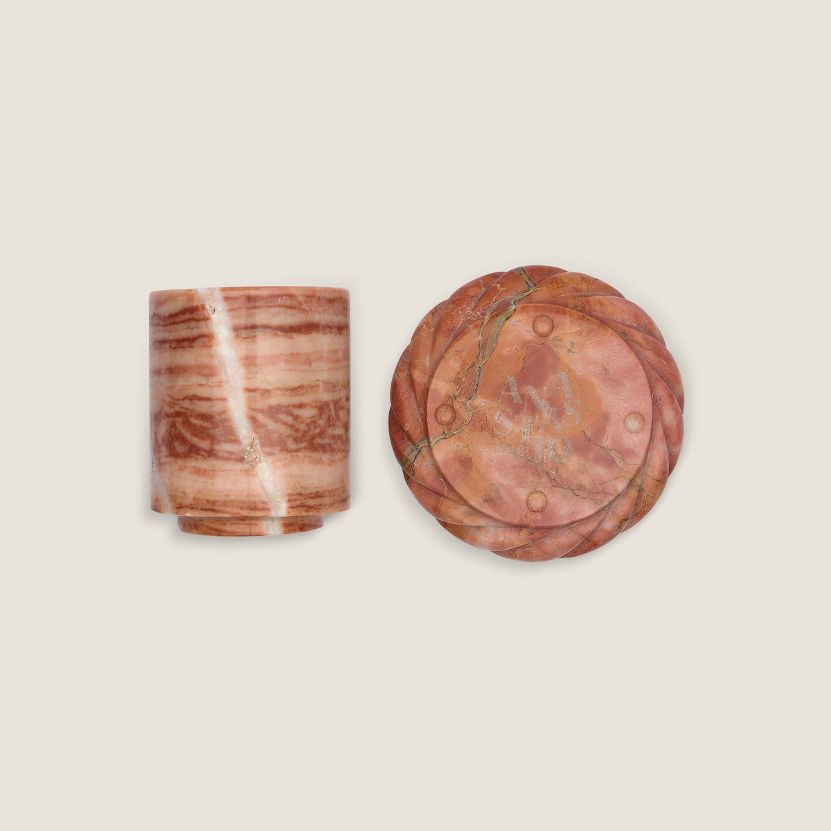 La Corda Piattina in Sweet Tart, underside with the Anastasio Home mark, beside a La Tazzina in Koi