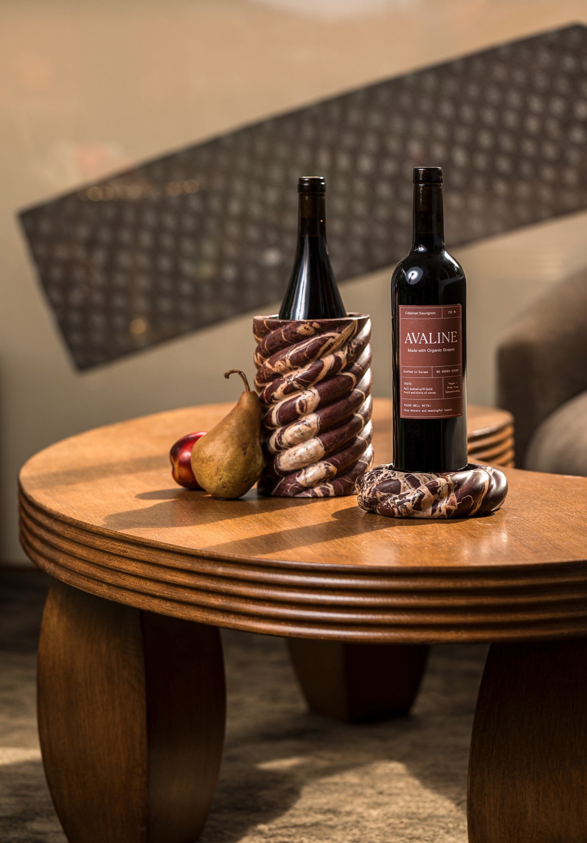 Avaline red wines with the Wine Chiller and Wine Coaster in Cabernet Red Marble on a wood table