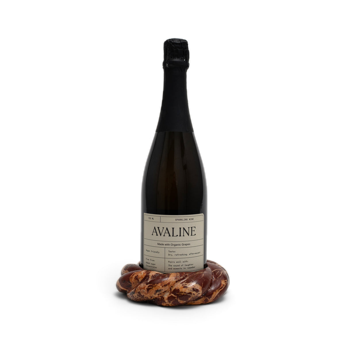 Wine Coaster in Cabernet Red Marble holding a bottle of Avaline Sparkling