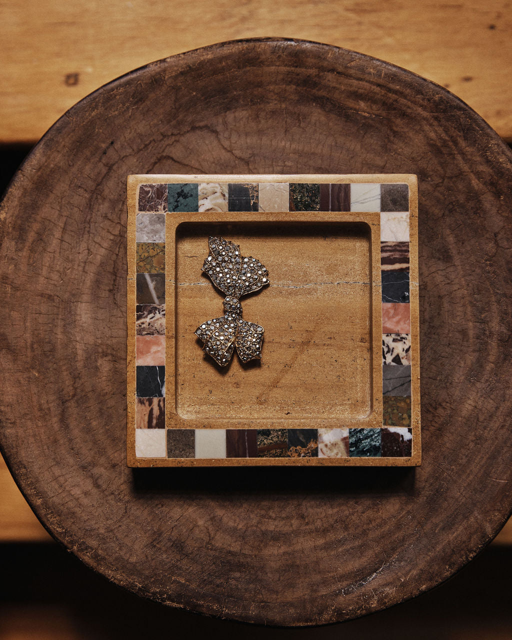 A square tray of inlaid specimen stone