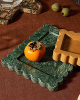 810 Tray, a rectangular scalloped marble vanity tray with a recessed inner dish